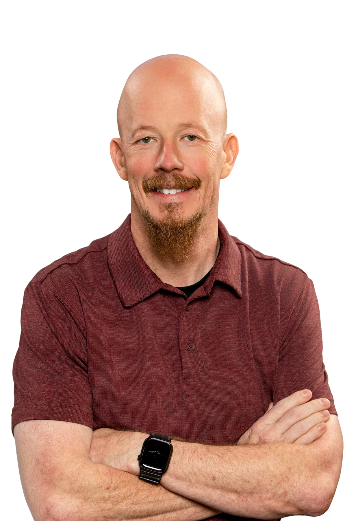 Adrian Appleberry smiling with arms folded, wearing a burgundy polo